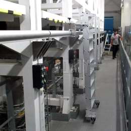 Ship ladder on wheels with a rail guide for sideways movement Ship ladder on wheels with a rail guide for sideways movement and machine access.